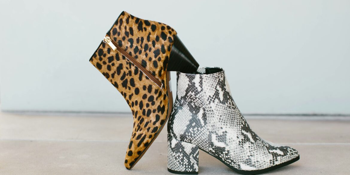 Brown cheetah-print and white snakeskin patterned ankle boots