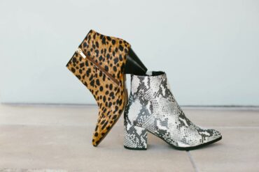 Brown cheetah-print and white snakeskin patterned ankle boots