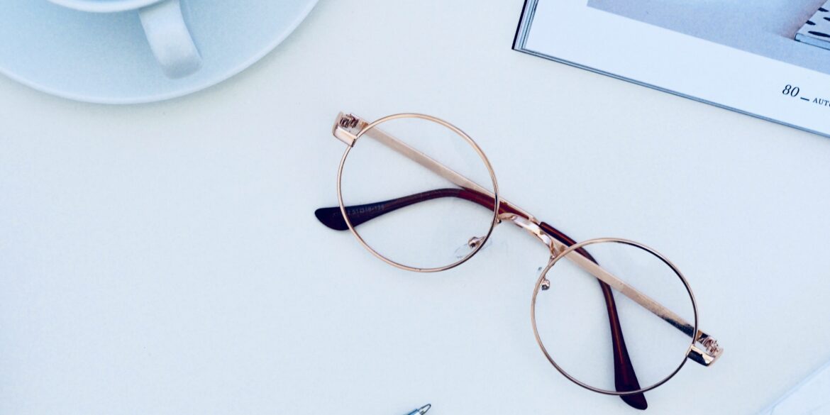 eyeglasses on white table